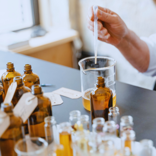A collection of ingredient samples alongside a technical dossier and formulation prototype. A collection of ingredient samples alongside a technical dossier and formulation prototype.